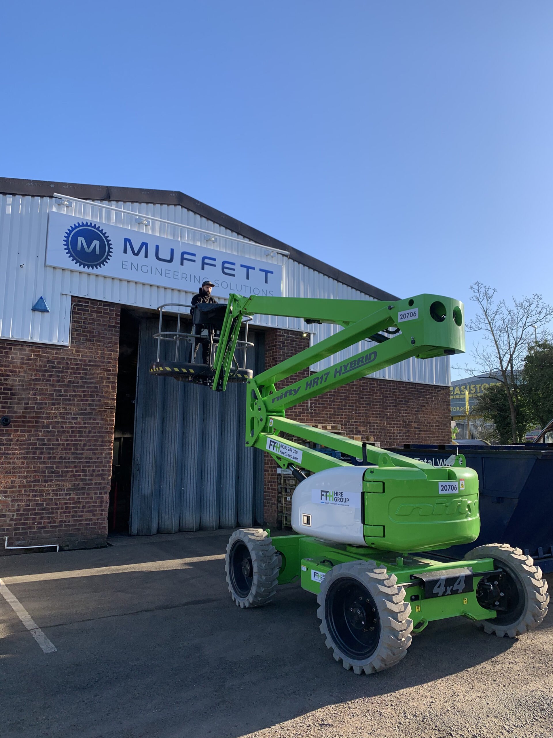 adams muffett signage new scaled